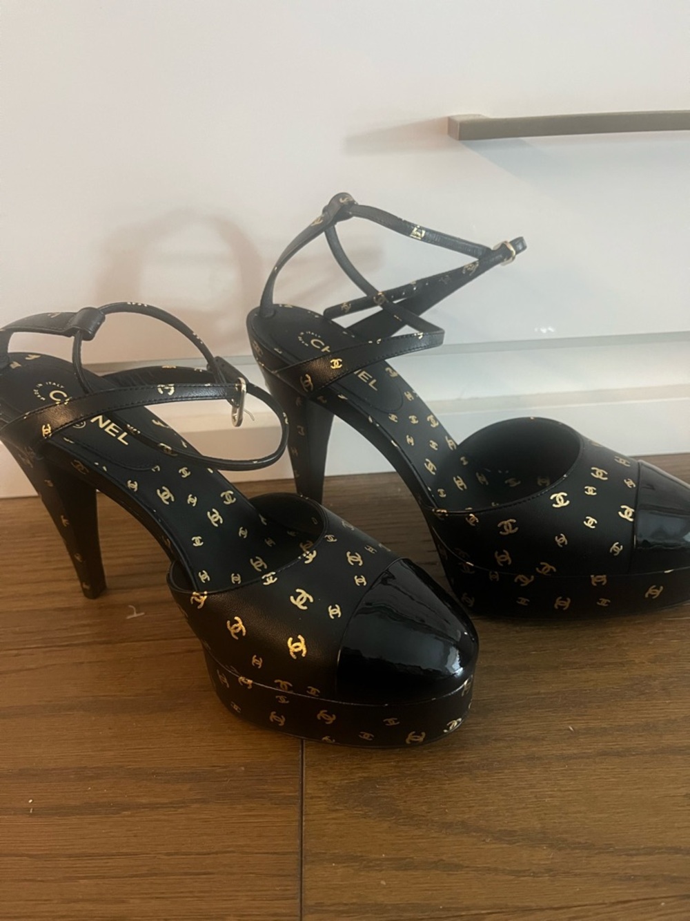 CHANEL Black Platform Heels with Gold Logo Print